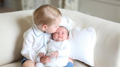 Prince George and Princess Charlotte are seen in this undated handout photo taken by the Duchess in mid-May at Anmer Hall in Norfolk and released by the Duke and Duchess of Cambridge on June 6, 2015. Duchess of Cambridge / Reuters