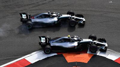 Valtteri Bottas, bottom of picture, and Lewis Hamilton tussle during the Russian Grand Prix. Hamilton would take the win ahead of his Finnish Mercedes-GP teammate. Getty Images