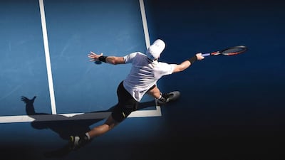 Britain’s Andy Murray hits a return against Sam Querrey of the US on January 20, 2017 on Day 5 of the Australian Open tennis tournament in Melbourne. Agence France-Presse