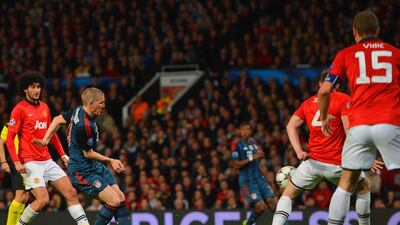 Bastian Schweinsteiger of Bayern Munich scores the equaliser in Tuesday night's 1-1 draw against Manchester United in the Champions League quarter-finals. Michael Regan / Bongarts / Getty Images / April 1, 2014