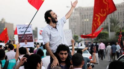 Egyptians protest against the International Monetary Fund loan in Cairo. Amr Nabil / AP Photo
