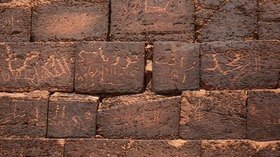 Names of visitors are seen carved into the stones of one of the Meroe pyramids, in al-Bagrawiya, Sudan.