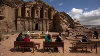 Tourists at the Deir Monastery in Petra. AFP