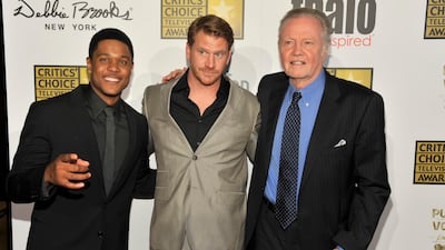 From left, Pooch Hall, Dash Mihok and Jon Voight arrive at the Critics' Choice Television Awards in the Beverly Hilton Hotel. Chris Pizzello / Invision / AP