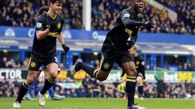 Wigan Athletic's Honduran defender Maynor Figueroa, right, celebrates scoring during their FA Cup quarter-final football match with Everton.