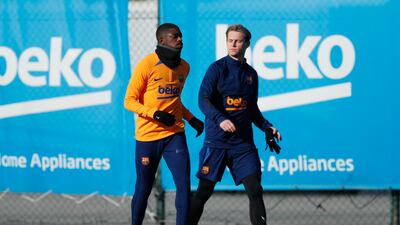 Ousmane Dembele and Frenkie de Jong during Barcelona's training session on Saturday, January 22, 2022. Reuters
