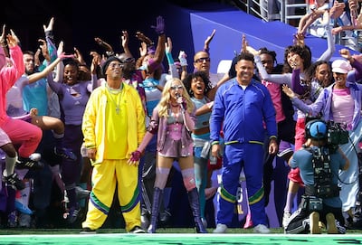 Madonna performs alongside Brazilian football greats Ronaldinho and Ronaldo during the World Cup final half-time show. EPA