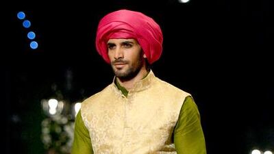 A model presents a creation by designer Zaheer Abbas. Rizwan Tabassum / AFP photo