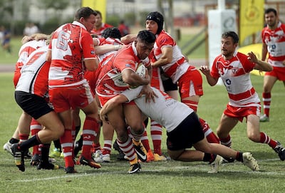 Action from Dubai Tigers (in red and white) and Sharjah Wanderers (in grey) during the UAE Conference final. Satish Kumar for the National