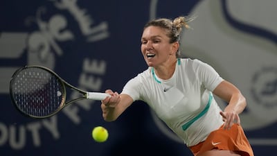 Simona Halep returns the ball to Ons Jabeur. AP