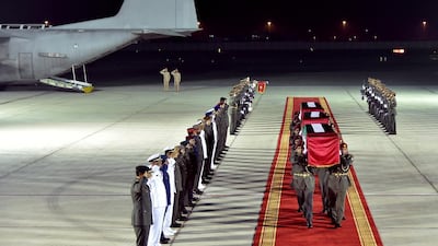 Home: the bodies of the three Emirati heroes are received with full ceremony at Al Bateen Airport on Saturday night. Wam