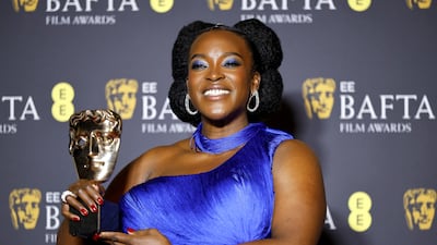 Wunmi Mosaku poses with the the Best Supporting Actress award, which she won for her role in Sinners. EPA