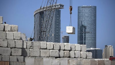 An additional 35,000 homes are expected to be completed in Abu Dhabi over the coming four years, most of which are apartments due to be built on Reem Island. Above, the exterior of Sky Tower on Reem Island. Silvia Razgova / The National