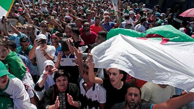 Algerian demonstrators take to the streets in the capital to protest against the government. AP