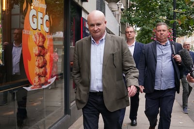 Rail, Maritime and Transport (RMT) union general secretary Mick Lynch leaves the Department for Transport in Westminster after government talks on Tuesday