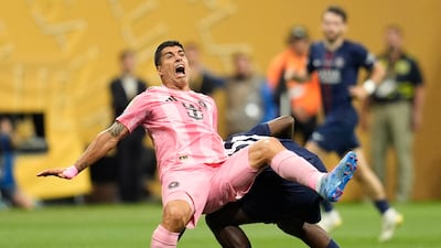 Inter Miami striker Luis Suarez under pressure from PSG's Willian Pacho. Reuters