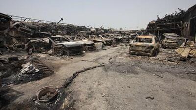 Hundreds of vehicles and spare parts worth millions of dirhams were destroyed in a fire that gutted three second-hand car warehouses on Monday. Jaime Puebla / The National