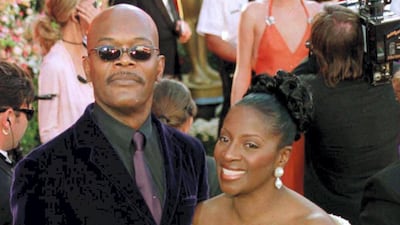 2000: Actor Samuel L Jackson wears a purple velvet suit at the 72nd Annual Academy Awards. Seen here with wife, LaTanya Richardson. Getty Images