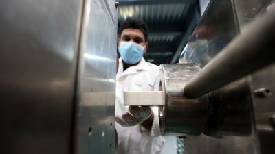 New bars of soap come out of the machine