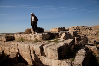 A shepherd stands on the unprotected Jerwan aqueduct built by King Sennacherib in about 700BC. Getty Images