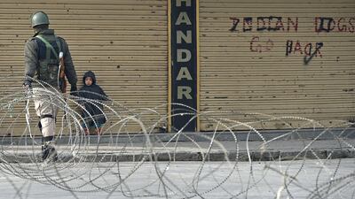 An Indian paramilitary trooper patrols in Srinagar during a general strike called by separatists on January 28, 2018 following the fatal shooting of two students by soldiers a day earlier. Tauseef Mustafa / AFP