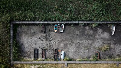 Boats lie on a dry lake bed in a port in Velence, Hungary, as a huge drought sweeps across Europe. AP Photo