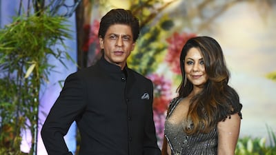Shah Rukh Khan and Gauri Khan pose for a picture during the wedding reception of actress Sonam Kapoor and businessman Anand Ahuja in Mumbai late on May 8, 2018. Photo / AFP
