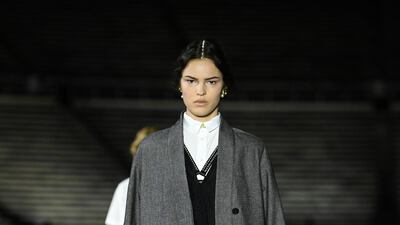 A model walks the runway during the Dior Cruise show 2022 at Panathenaic Stadium on June 17, 2021 in Athens, Greece. AFP