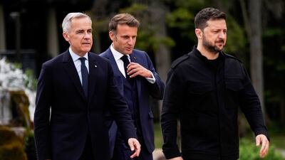 From left, Canadian Prime Minister Mark Carney, French President Emmanuel Macron and Ukrainian President Volodymyr Zelenskyy at the G7 Summit in Kananaskis, Alberta, on June 17. The Canadian Press via AP