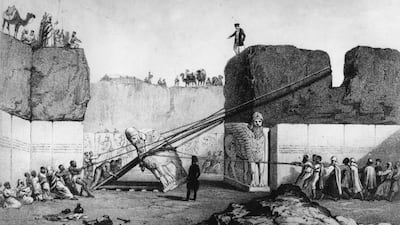 A colossal winged bull with the head of a deity is removed from the mound of Nineveh in Iraq during Austen Henry Layard's expedition of 1841-45. Getty Images