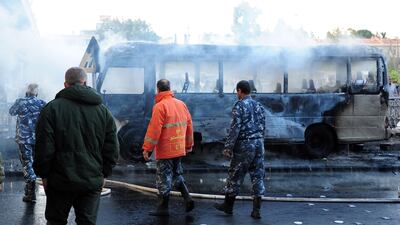 Two roadside bombs exploded near a bus carrying troops in early morning of October 20 near Al Tanf base, which is used by US troops. At least 14 people were killed and three others wounded, according to a state TV report. EPA / Syrian Arab News Agency
