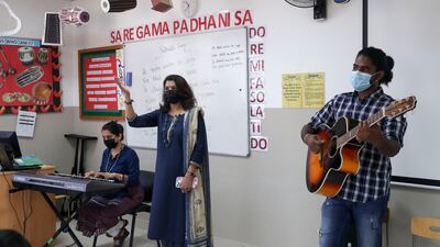 Music teachers and pupils at Delhi Private School. Khushnum Bhandari / The National