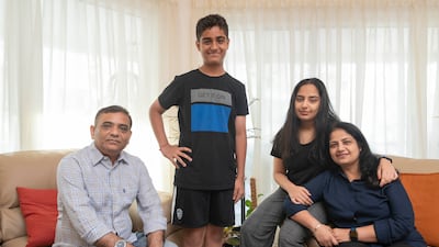Arpita Trivedi and her family use buckets for bathing to save water at their home in Dubai. Antonie Robertson / The National