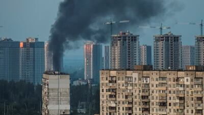 Smoke rises after a Russian missile strike in Kyiv. Reuters