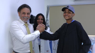 Mohammed Garba, who was flown to Dubai from Nigeria to have extensive treatment for burn injuries, is pictured with Dr Sanjay Parashar. Photo: Cocoona Clinic