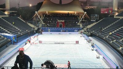 Rain causes a delay to the mixed doubles match between the Indian Aces and Philippine Mavericks. Jeffrey E Biteng / The National