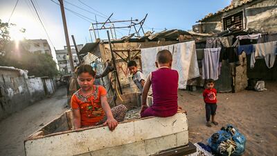 Palestinian refugees children play outside their family house in the streets of Khan Younis refugee camp in southern Gaza Strip . World Refugee Day is marked on 20 June each year to highlight the suffering of the tens of millions of people forced to flee their homes due to war or persecution. Nearly one-third of the registered Palestine refugees, more than 1.5 million individuals, live in 58 recognized Palestine refugee camps in Jordan, Lebanon, the Syrian Arab Republic, the Gaza Strip and the West Bank, including East Jerusalem. EPA