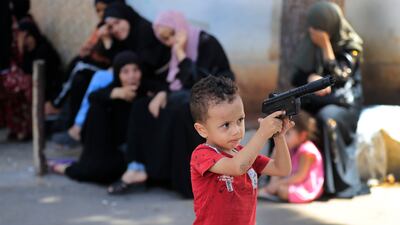 This Palestinian boy’s family fled their home after clashes at the refugee camp. AP