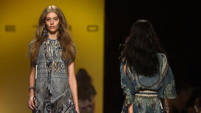 A model presents a creation from the Etro collection during the 2015 Spring / Summer Milan Fashion Week on September 19, 2014 in Milan. AFP