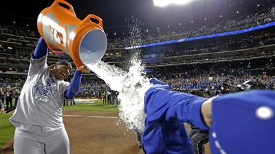 Kansas City Royals’ Salvador Perez dunks manager Ned Yost after winning Game 5 and the World Series against the New York Mets. David J Phillip / AP Photo