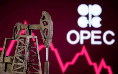 A 3D printed oil pump jack is in front of displayed stock graph and Opec logo in this illustration picture, April 14. Reuters