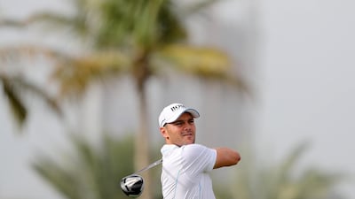 Martin Kaymer tees off on the 13th hole on the 1st day of the Omega Dubai Desert Classic. Chris Whiteoak / The National