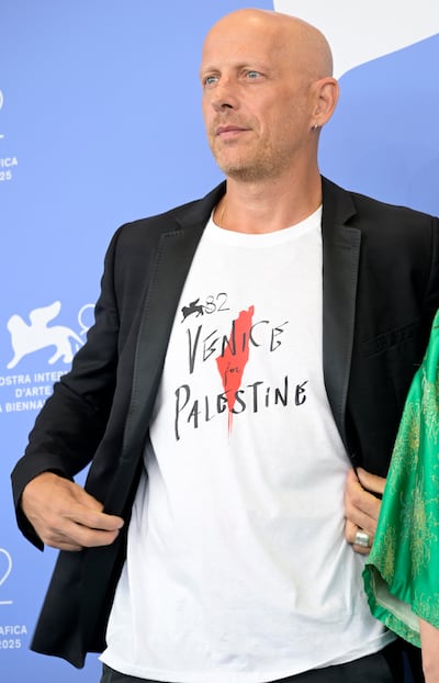 Italian screenwriter and producer Stefano Sardo wears a T-shirt that reads Venice for Palestine at festival. EPA
