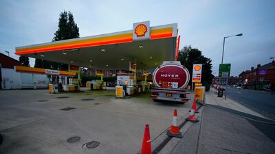 A tanker delivers fuel to a petrol station in Liverpool, England. Photo: PA