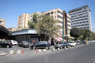Drivers queue at a petrol station to refuel in Tehran. AFP