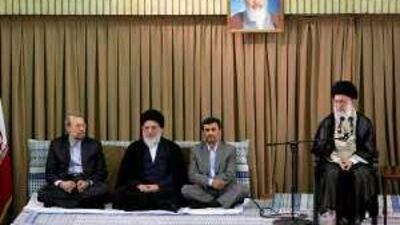 The supreme leader Ayatollah Ali Khamenei, far right, yesterday reacted angrily to calls for a referendum on the legitmacy of last month's presidential election.
