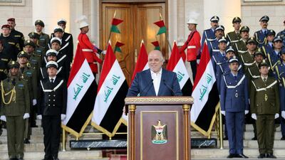 Iraqi prime minister Haider Al Abadi delivers a speech in Baghdad on December 9, 2017 to announce the country's victory over ISIL after three years of fighting to regain territory captured by the extremist group. Iraqi Prime Minister Media Office via Reuters