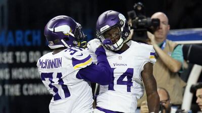 Minnesota Vikings wide receiver Stefon Diggs, right, celebrates a touchdown on Sunday in his team's NFL win over the Detroit Lions. Duan Burleson / AP / October 25, 2015