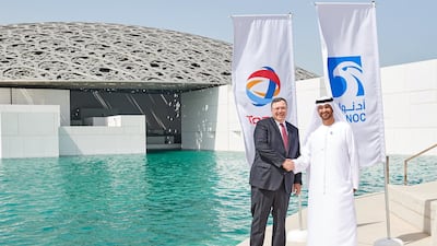 Patrick Pouyanne, chairman and CEO of Total, with Dr Sultan Al Jaber, Minister of State and CEO of Abu Dhabi National Oil Company, after signing an offshore concession agreement on March 18. 2018. Courtesy Adnoc