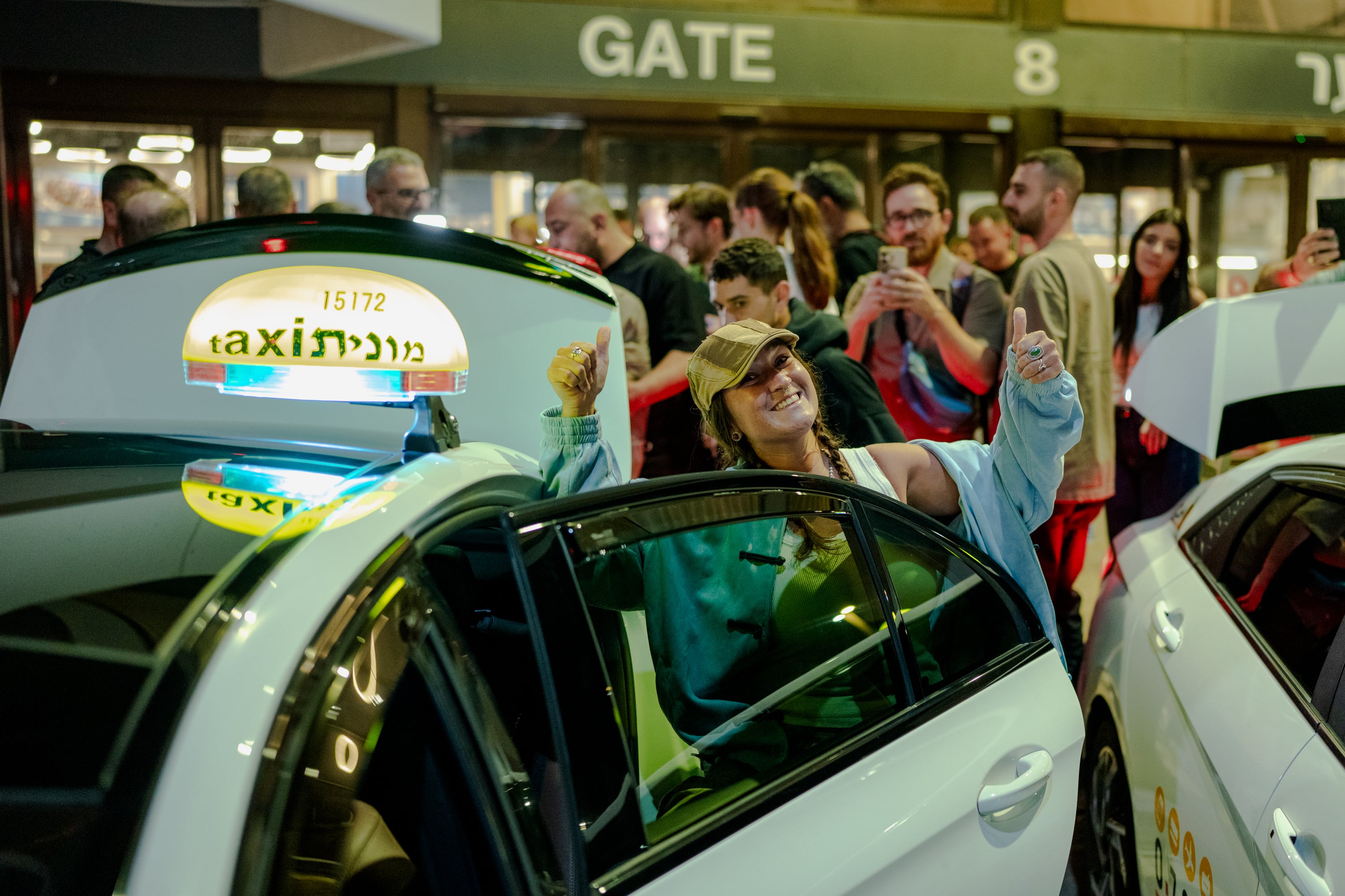 A relieved passenger from Flight FZ1073 after landing in Israel. Getty Images